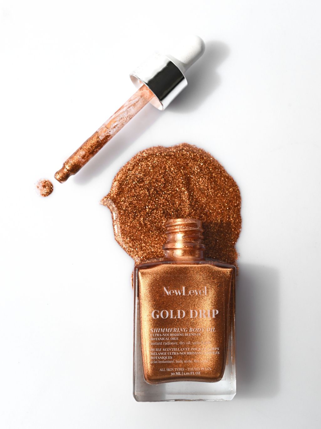 LIMITED EDITION GOLD DRIP BRONZING SHIMMERING BODY OIL (TRAVEL SIZE) WITH BODY KABUKI BRUSH